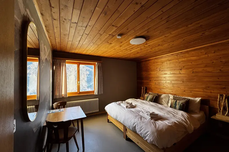 The St. Moritz room: a cosy double room with a private bathroom and a view of the valley.